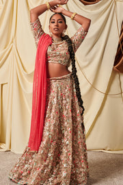 Excellence of Virtue  Beige/Gold net lehenga with intricate flower work on lehenga and blouse.  Comes with a contrast dupatta.   Skirt Length: 42 inches (Can not be altered)  Note: Blouse style and complimentary jewelry may vary depending on size and availability.