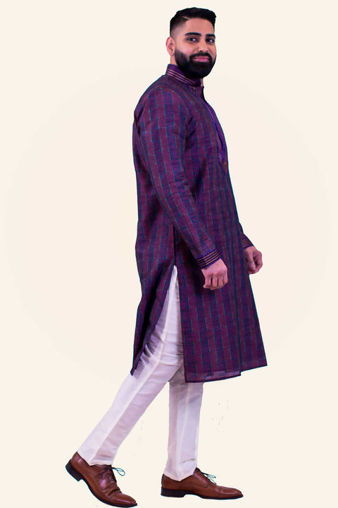 Masculine deep purple light weight kurta with copper detail on collar and suddle elegant print throughout the kurta. Paired with white bottoms.
