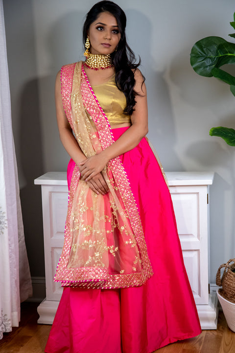 Hard to understand   Magenta Skirt paired with gold dupatta and magenta border.   Skirt Length: 40 (Can not be altered)  Note: Blouse style and complimentary jewelry may vary depending on size and availability.