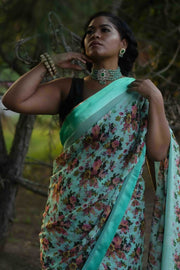 Lightweight emerald silk sari with flower print