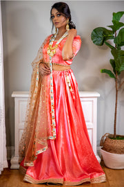 Smooth and Sweet  Peach skirt with drawstring, matching colored blouse with detailed pearl and gold dupatta.   Skirt Length: 40 (Can not be altered) Sleeve Measurements: Arm Hole: 18 inches, Bicep 12 inches, Elbow 10 inches   Note: Blouse style and complimentary jewelry may vary depending on size and availability.