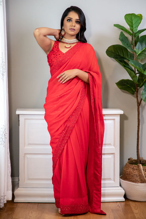 If you were looking for a sign, here it is...  Red chiffon sari with bead work on the border.     Note: Sari comes with a petticoat, blouse, and jewelry. 