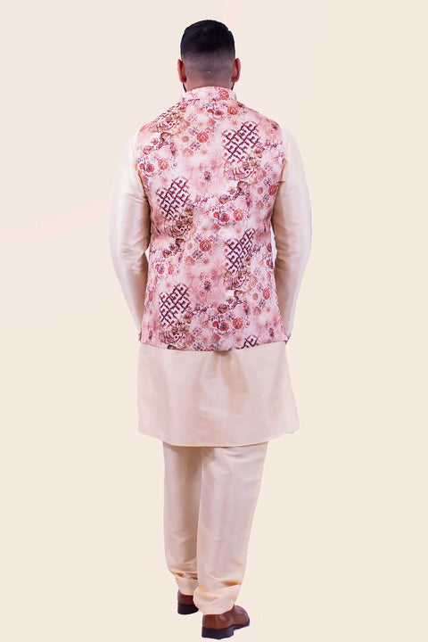 Three piece champagne colored kurta paired with cherry blossom print sherwani, paired with matching champagne colored pants.