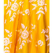 Yellow lehenga with white thread flower workCoy two piece yellow lehenga with luscious white flowers threaded on skirt. Paired with simple modern blouse. Finish this look with yellow chiffon dupatta decorated with gold trim on shoulders/ shoulder. 
